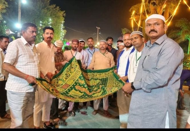 The Urs begins at Dada Miyan's Dargah in Mishripur with the ceremonial offering of a *chadar*.