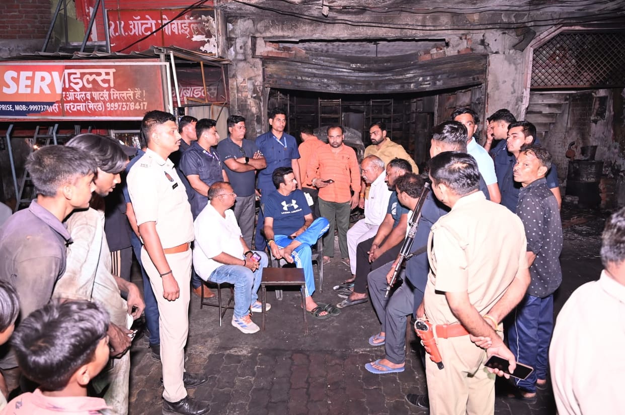 Former MLA meets arson victim's family