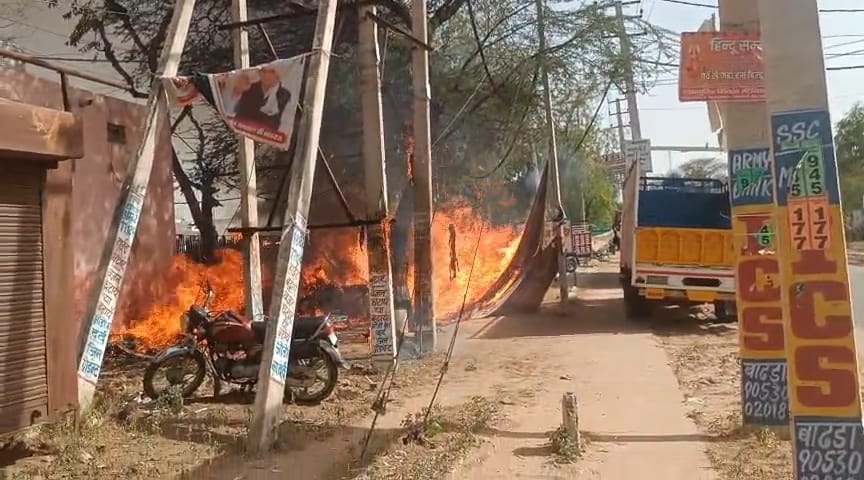 Storm-fueled fire engulfs farmers' protest, shoe shop, and fodder