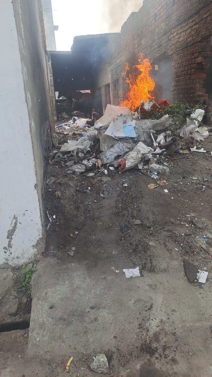 Accused of burning garbage in vacant plots, demand for action