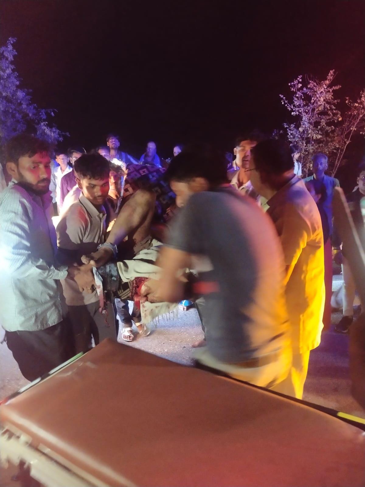 A dumper rams into a parked tourist bus, killing the driver and injuring 11 passengers.