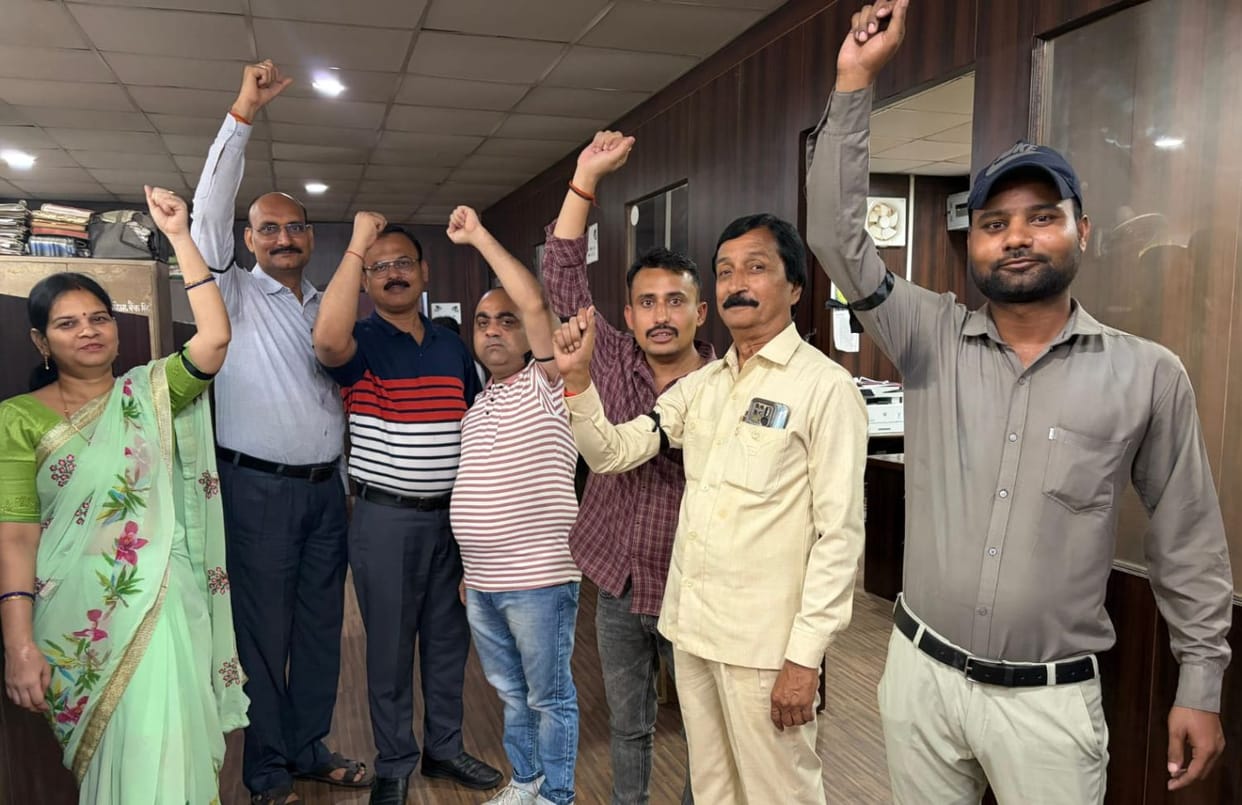 Cooperative bank employees protested by wearing black bands.