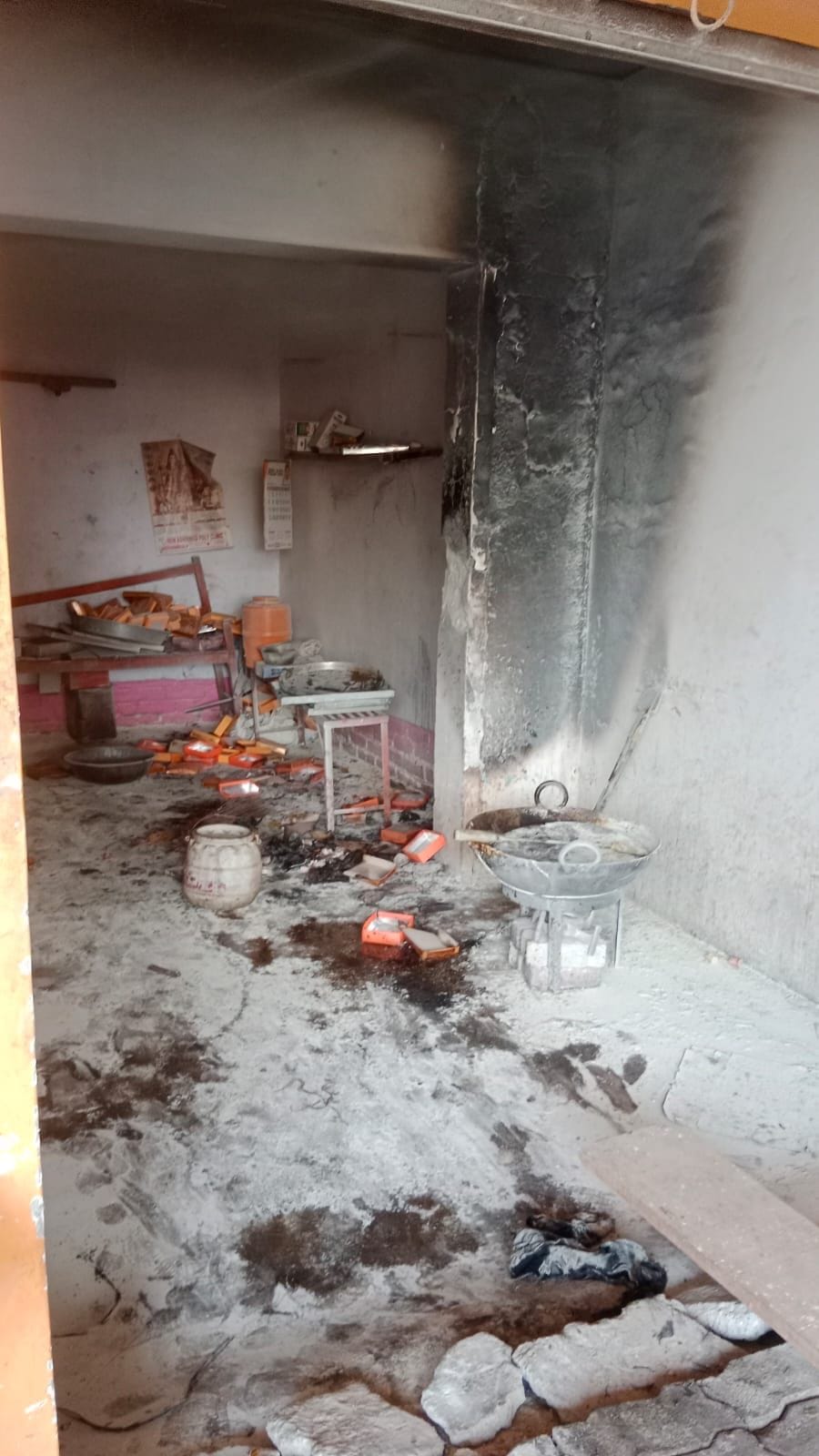 A gas leak caused a fire in a sweet shop, burning goods to ashes