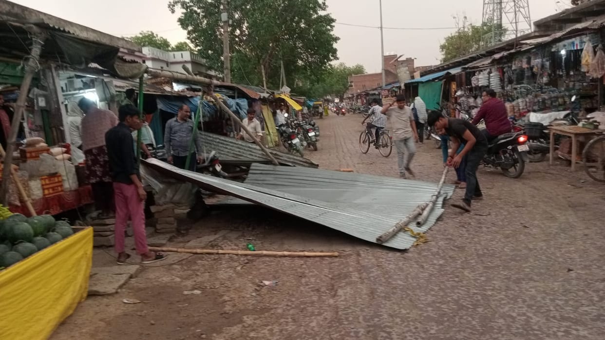 Due to a severe storm, falling trees and branches crushed vehicles in some areas, while snapped power lines brought electricity supply to a standstill in others; solar panels were also blown away.