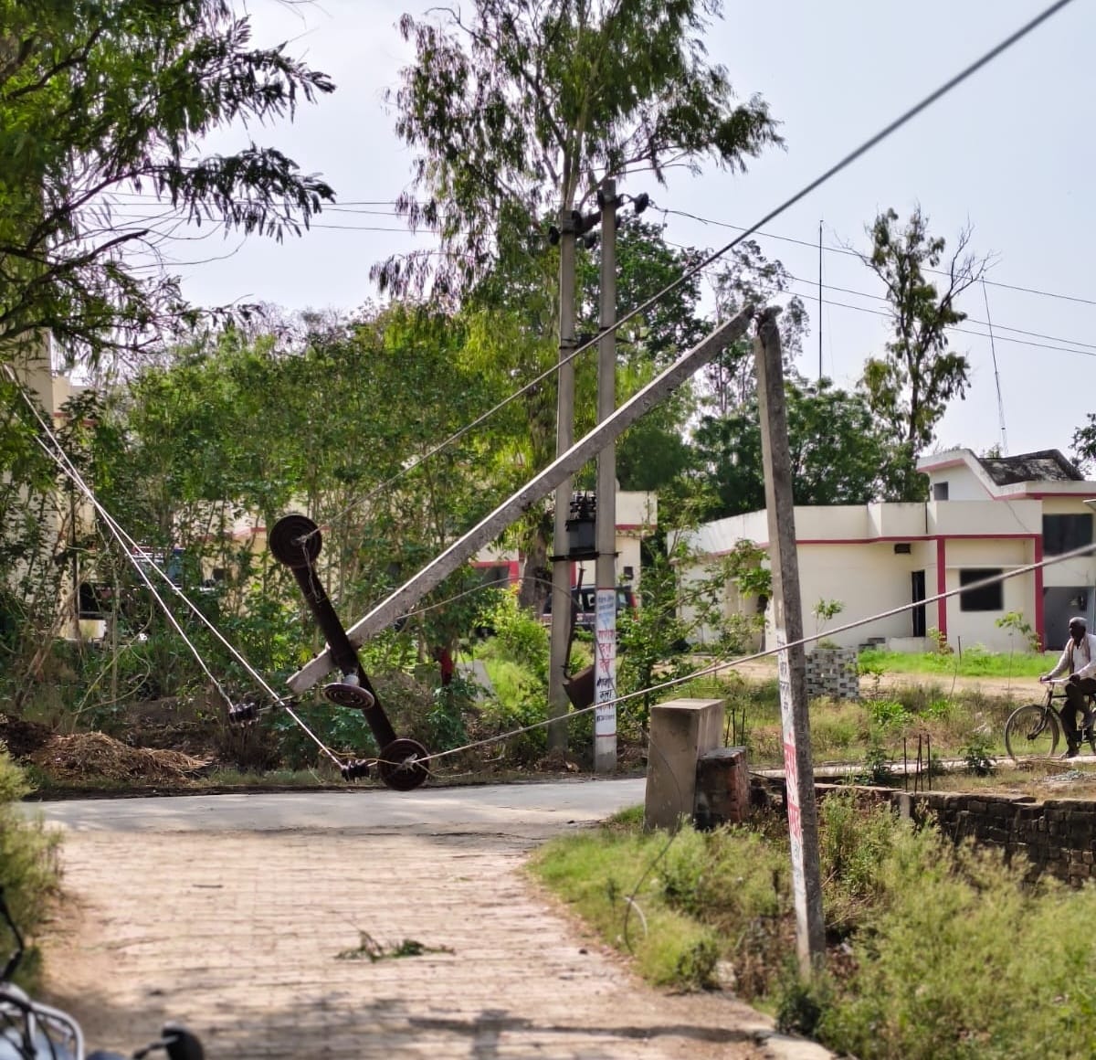 Two people died in Dharwara and Koilari Khurd after a storm-induced wall collapse, and 600 electricity poles were damaged.