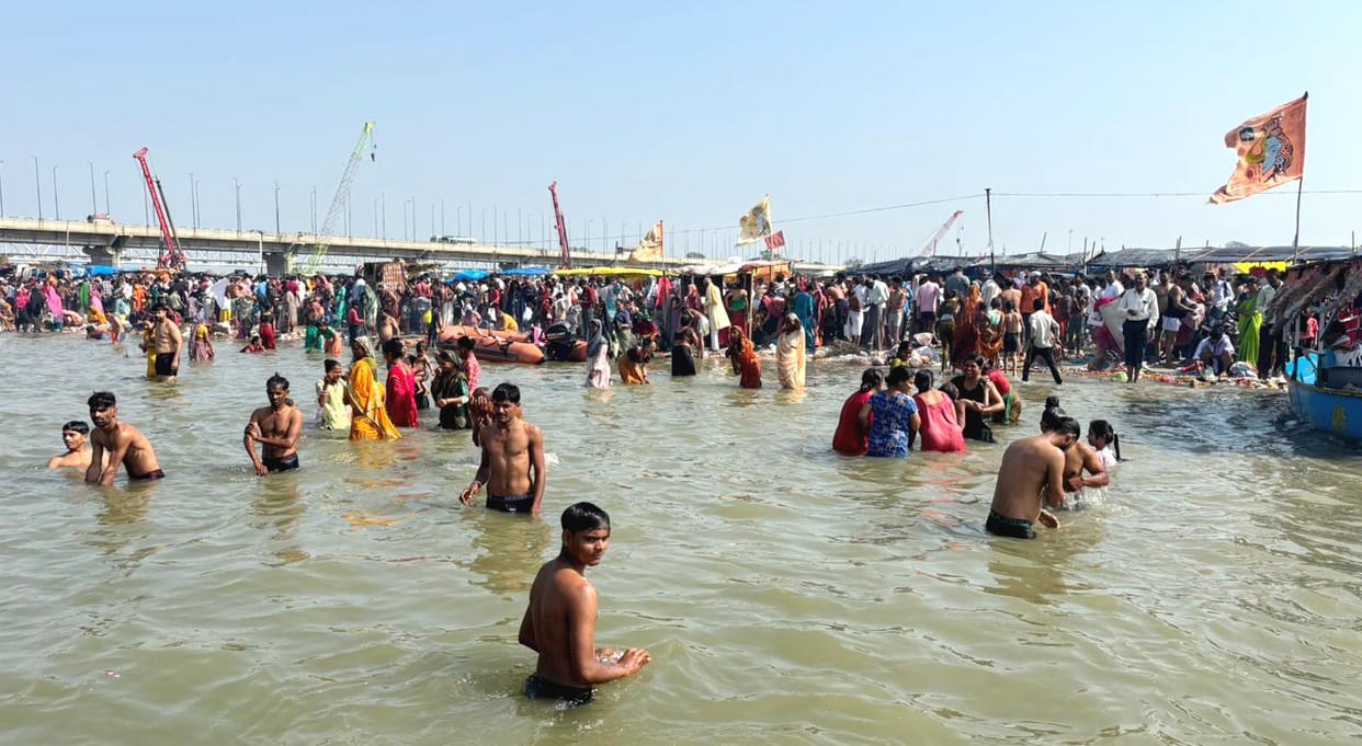 Devotees throng Kachhla, taking a holy dip to worship Mother Ganga.