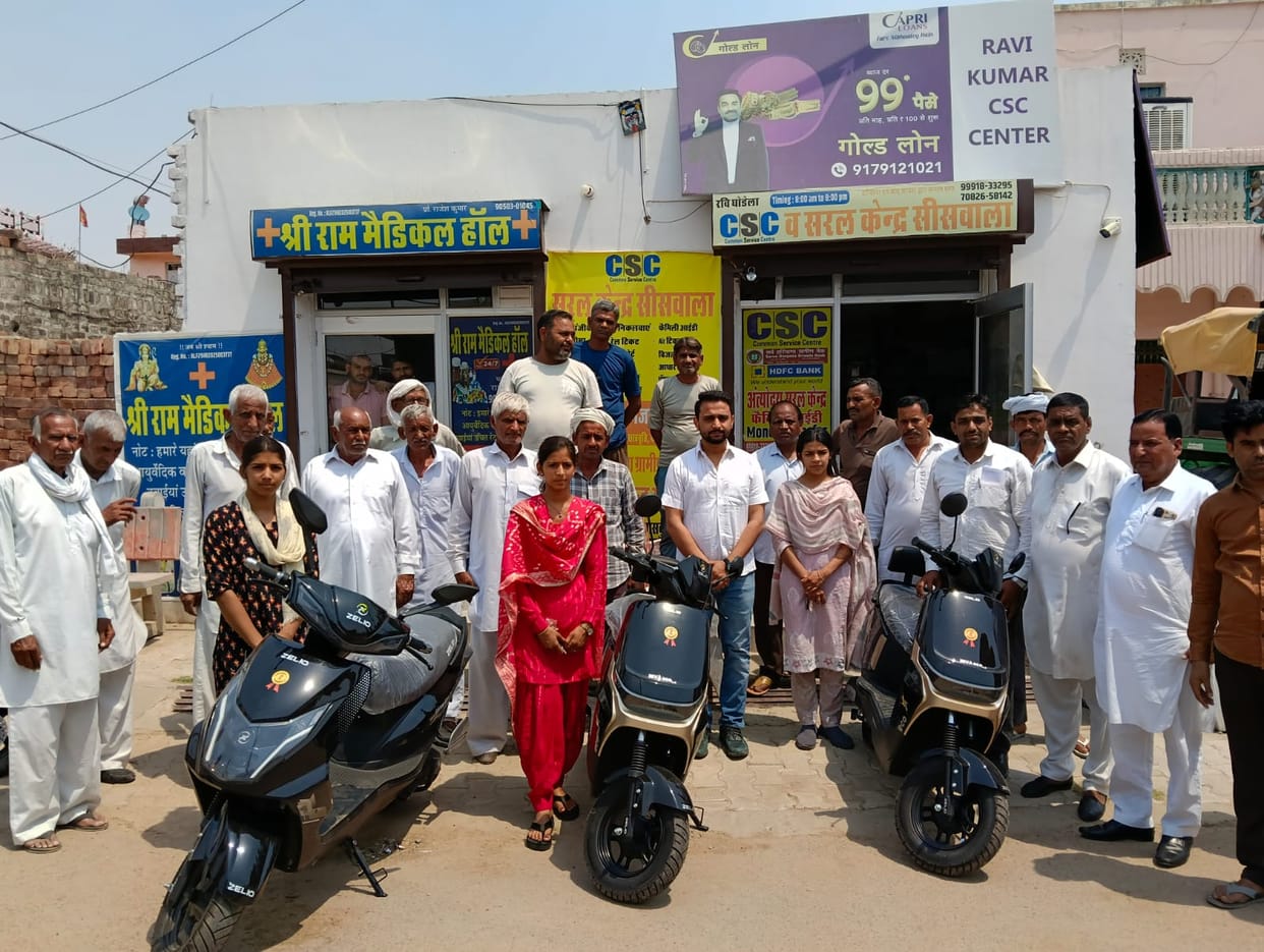 Daughters' faces lit up after receiving scooters at CSC Siswala, saying going to college will be easier.