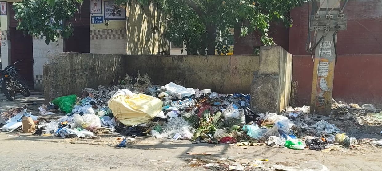 Piles of garbage near Kundan Cinema; the stench has made life unbearable for residents.