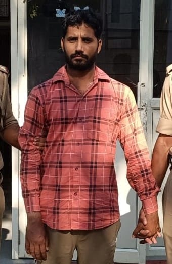 Husband arrested on charges of dousing wife with petrol and setting her on fire.