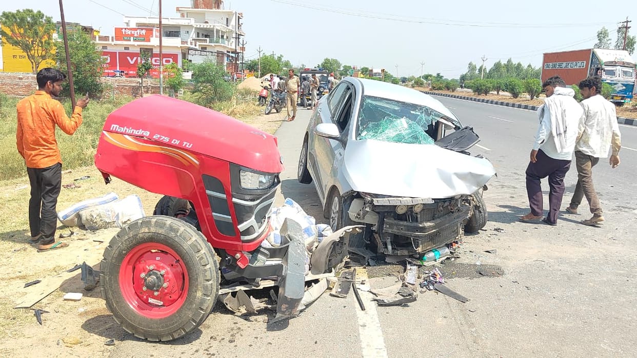 A car and a tractor collided while trying to save a biker, resulting in the death of a woman.