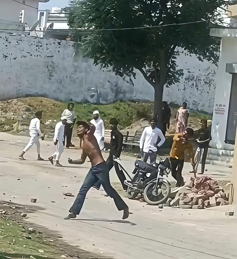 Two groups pelted stones over an old rivalry, injuring five.