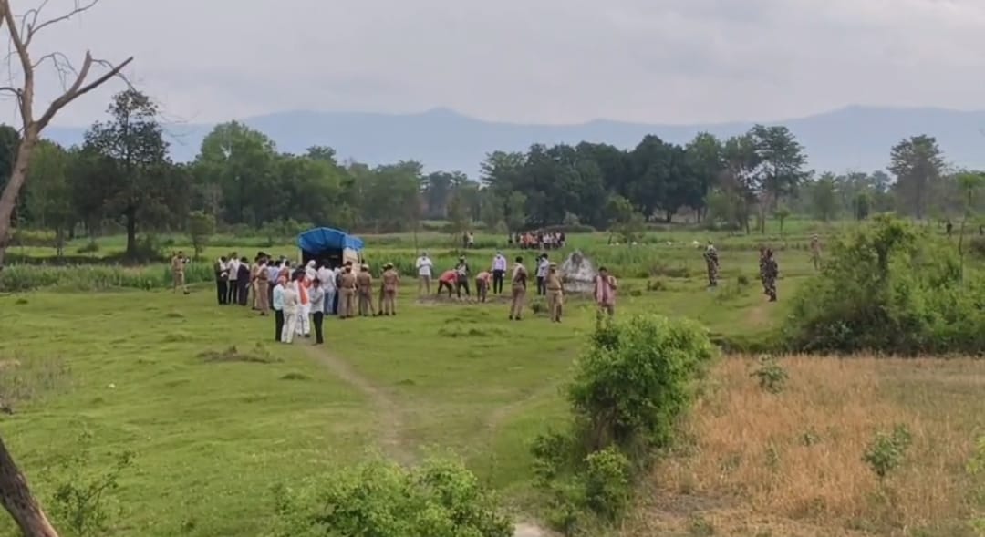 In the presence of a magistrate, the police exhumed the woman's body from the grave.