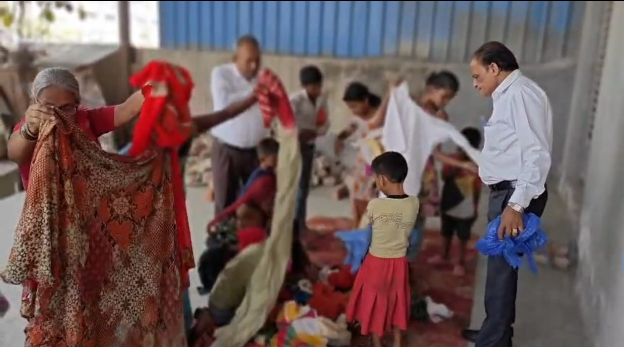 Distributed clothes and household items to the needy