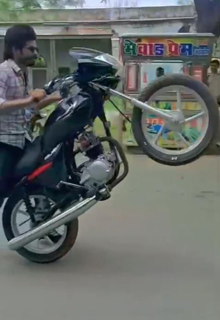 Bike Ridden on One Wheel in Front of College; Two Arrested