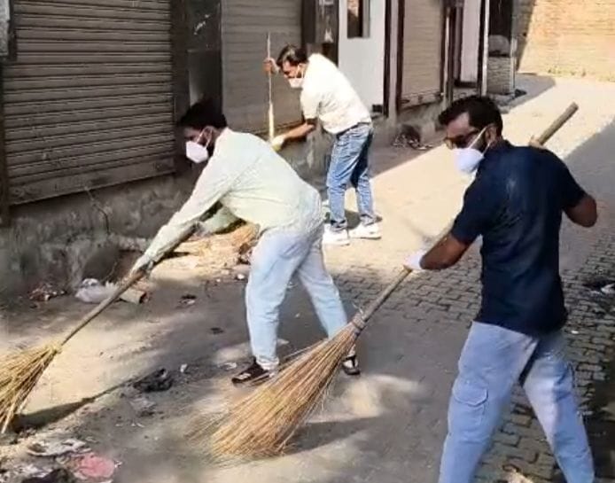 The Chairman, along with the ward members, carried out a cleanup drive by sweeping.