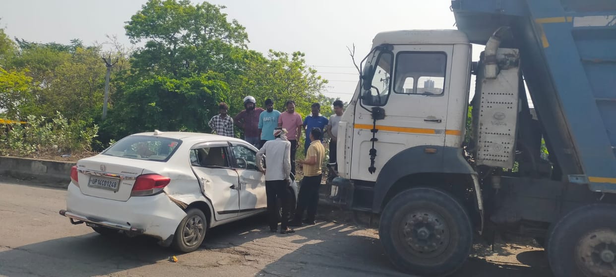 Mother and Son Riding in Car Injured After Collision with Dumper