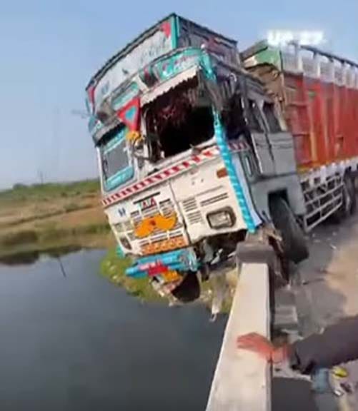 Gomti Bridge railing damaged by out-of-control truck.