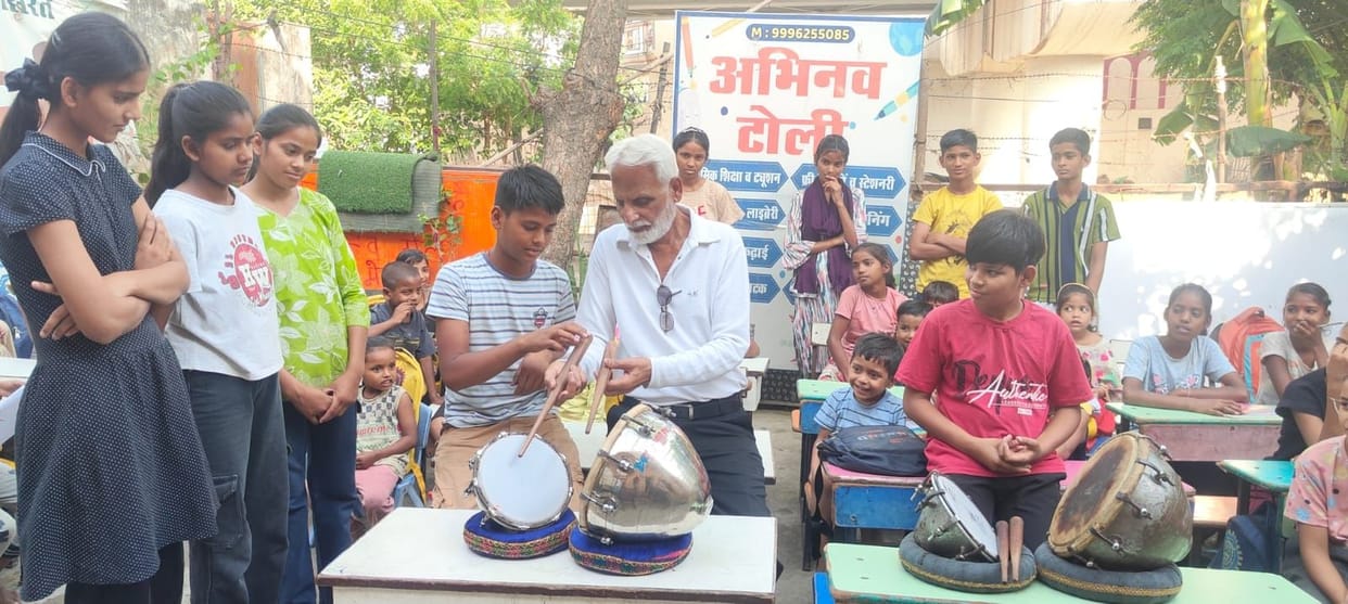 Subhash will teach drum playing in the Abhinav group.