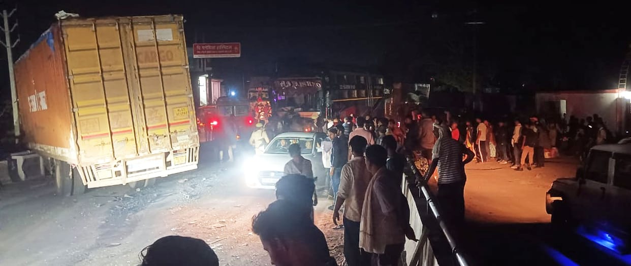 Uncle-nephew killed, 12 injured in collision with speeding container