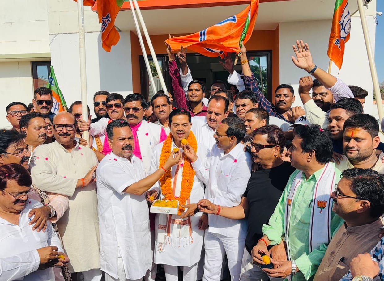 BJP members celebrated massive victories in West Bengal, Assam, and Puducherry.