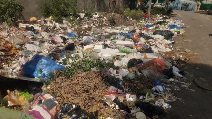 The city is choked with garbage, and a foul stench is rising
