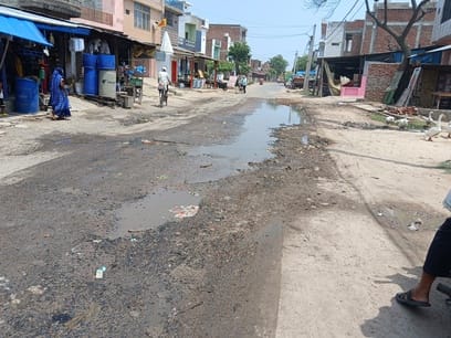 The drain is high and the road is low... dirty water is flowing on the road