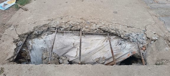 Danger of accident due to dilapidated slabs placed on drains