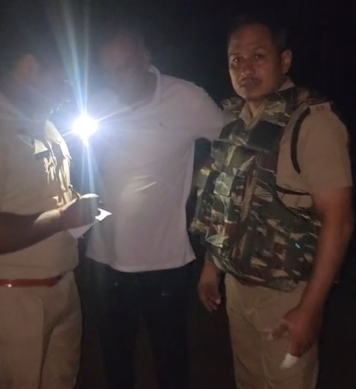 A man carrying a reward of Rs 5,000 was arrested in a police encounter and was shot in the leg.