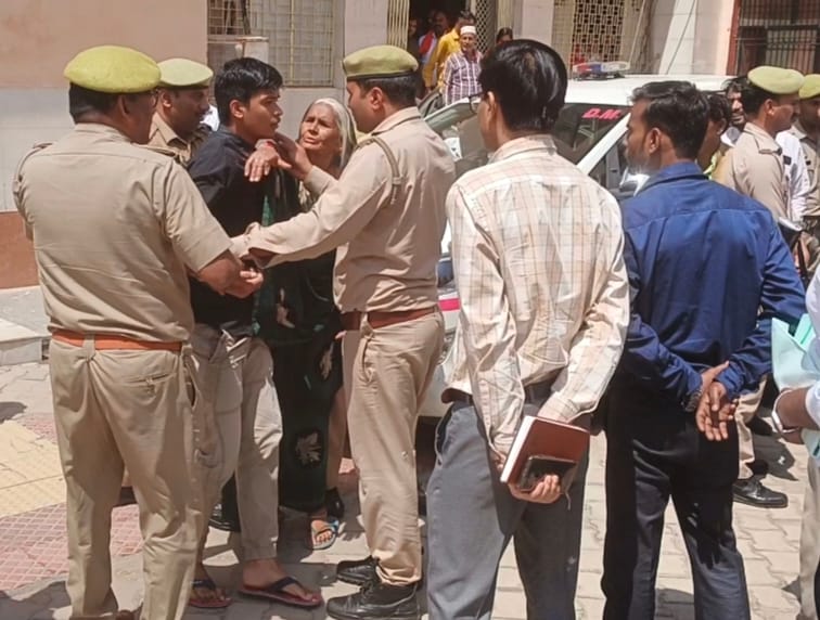 Martyr's family lay down in front of DM's car, said- save us, they have guns