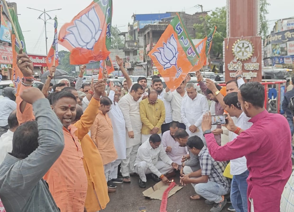 Celebrations were expressed by distributing sweets over the BJP's victory in West Bengal.