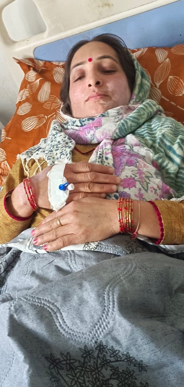 Three people are being treated in hospital after being stung by bees.