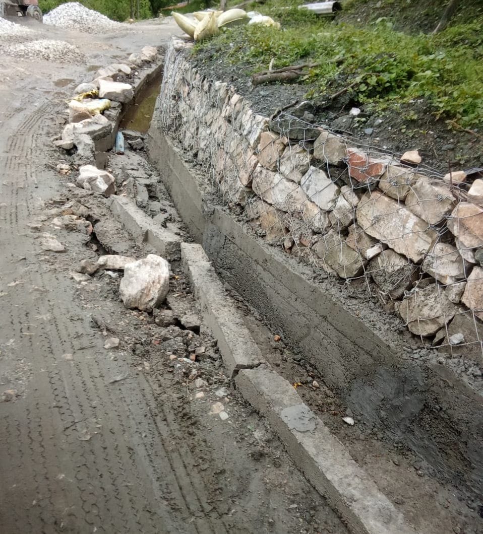 Villagers raised questions on the construction of a drain along the Darkali road