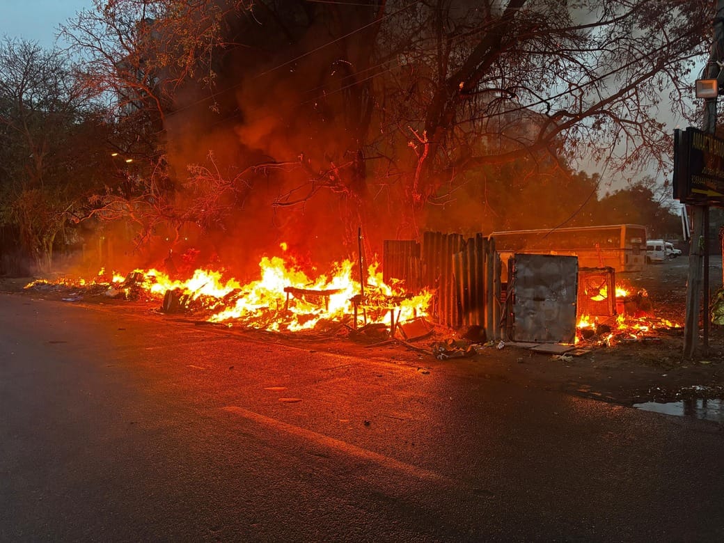 Sparks from High-Tension Line During Storm; Five Shanties Reduced to Ashes
