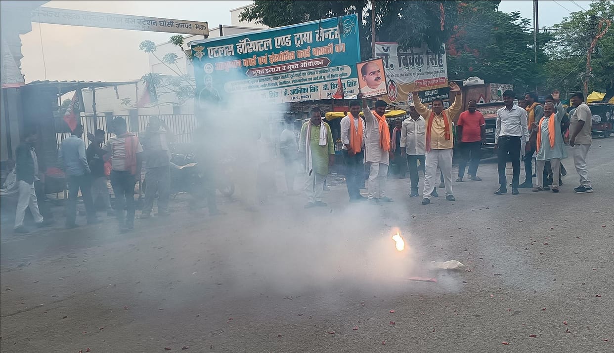 Expressed happiness by bursting crackers and distributing sweets