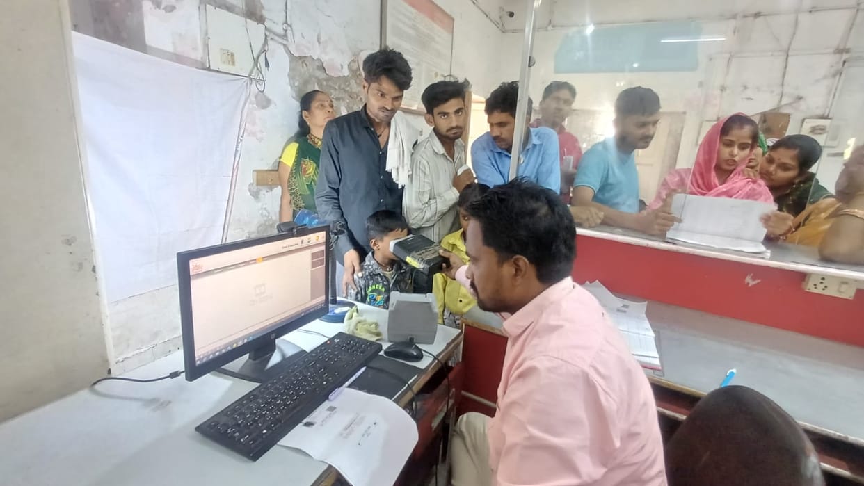 Crowds gather at post offices to update 10-year-old Aadhaar cards