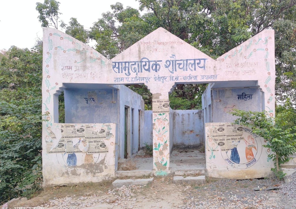 Dilapidated public toilet building in the village