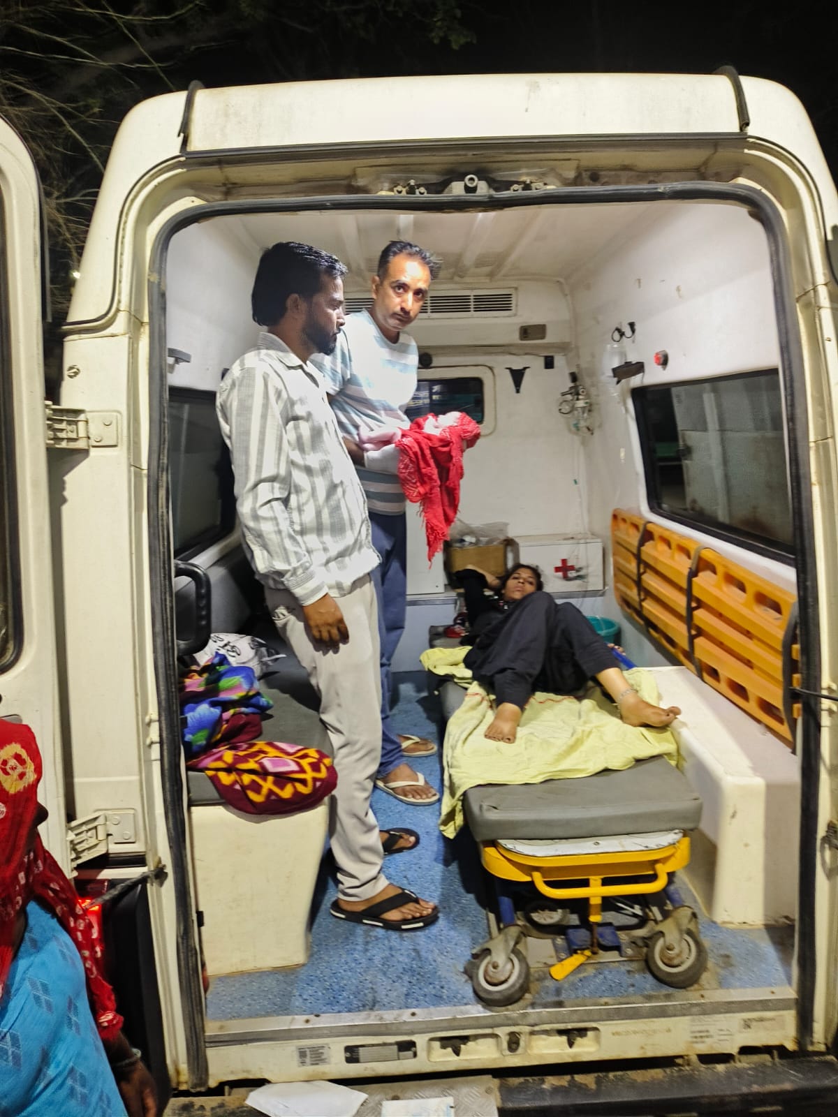 A baby's cry echoed in a moving ambulance, and a safe delivery took place on the way