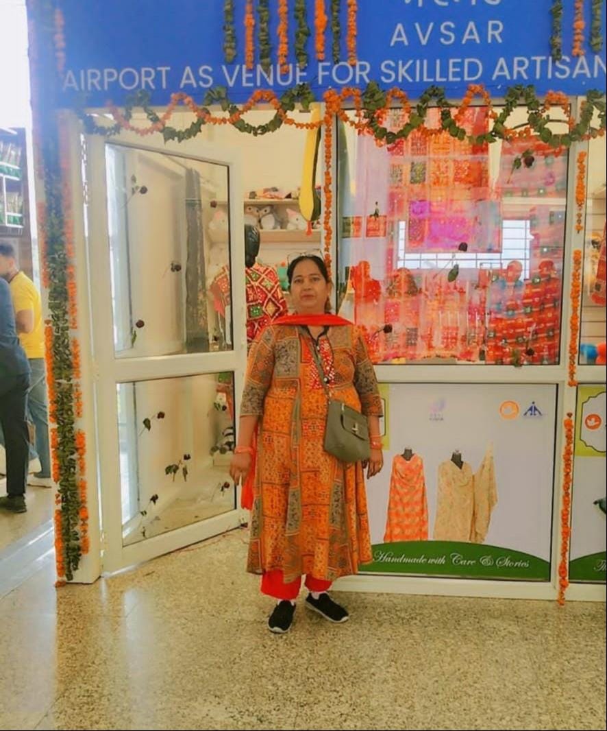 Indigenous market decorated at the airport, five women set up a stall