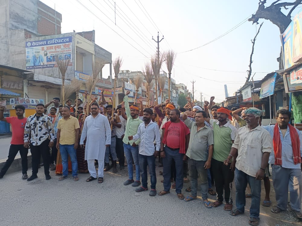 Angry sanitation workers staged a protest after a fellow worker was treated badly.