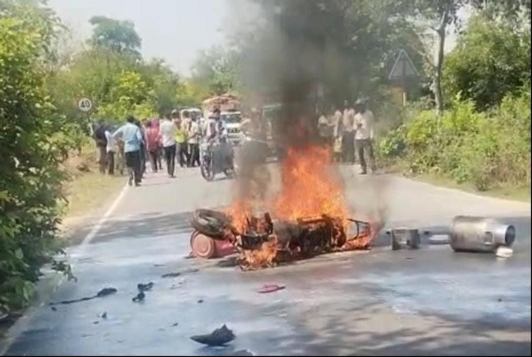 Bike burns after collision, three injured