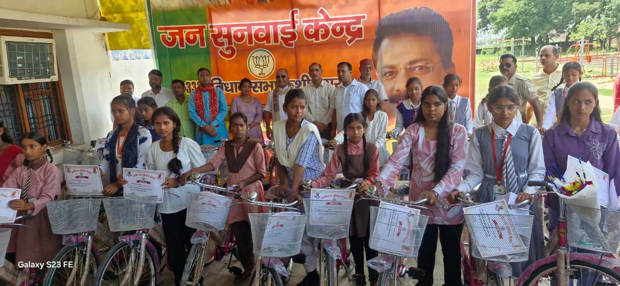 Scheduled Tribe female students receive bicycles.