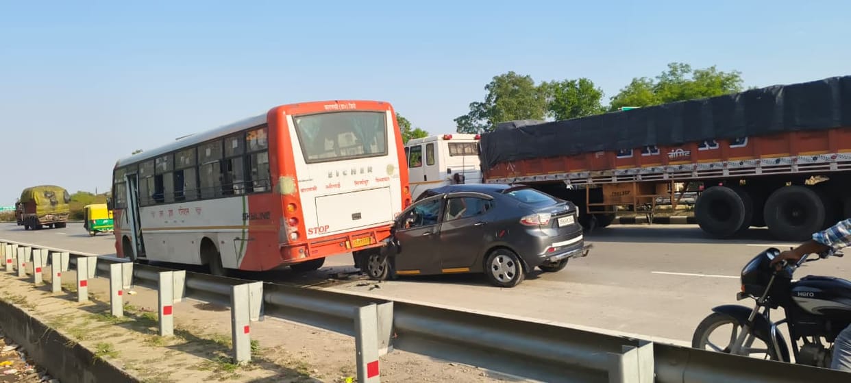 Car rams into bus parked for repair, driver injured