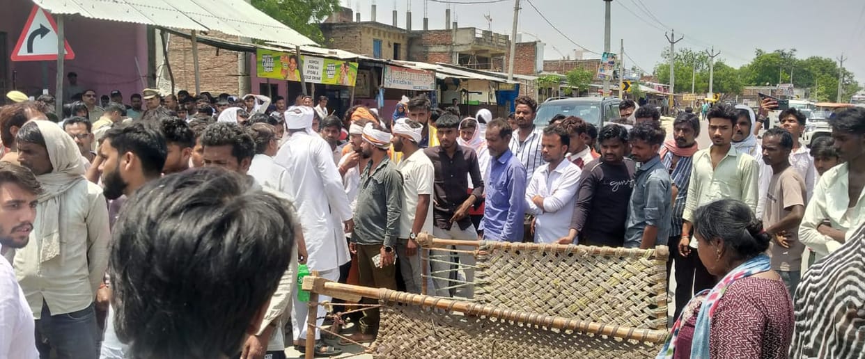 Villagers blocked the road by placing the child's body on the road.