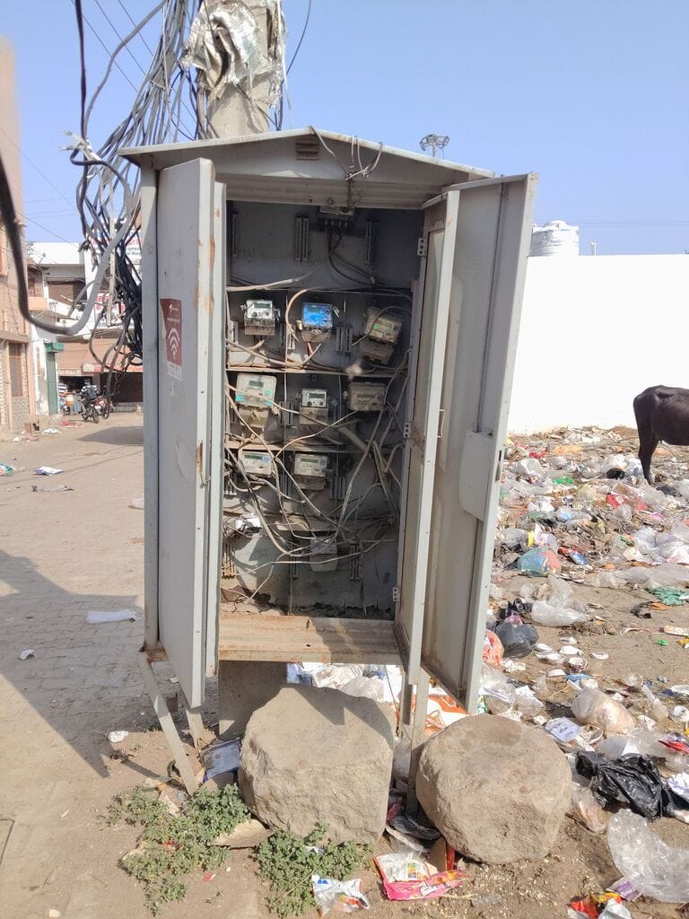 Open electricity meter box in front of Jain Chowk KM School, risk of accident