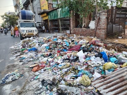 Heaps of garbage pile up in the city due to the sanitation workers' strike.