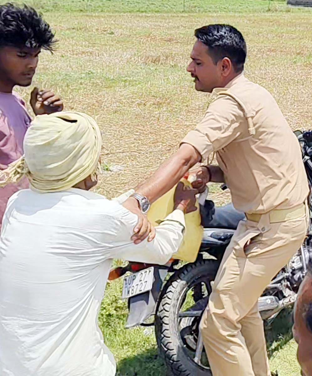 A woman arrived carrying a canister filled with petrol, right in the presence of the Tehsildar and the Station House Officer.
