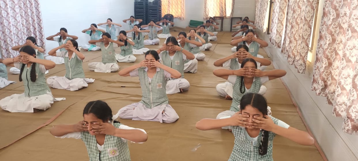 The students were told about the importance of yoga, pranayama and healthy lifestyle.