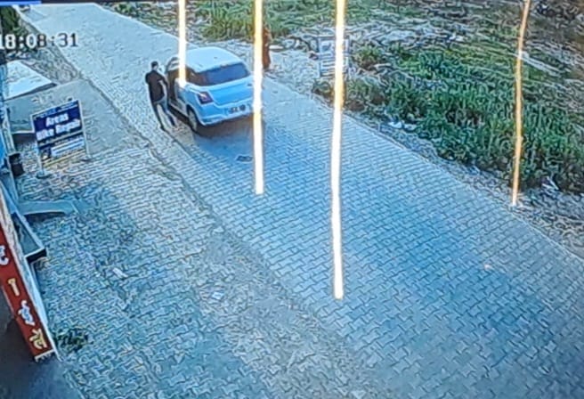 He snatched the chain from the woman's neck and fled in his car.