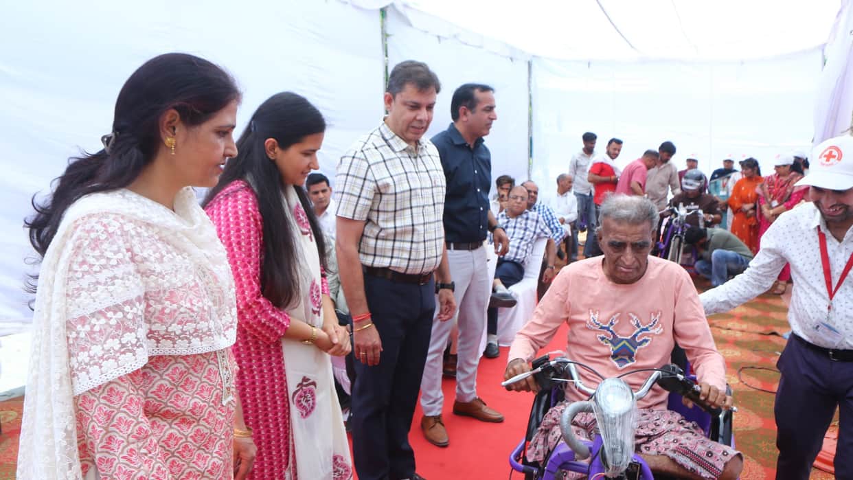 Tricycles given to handicapped on Red Cross Day