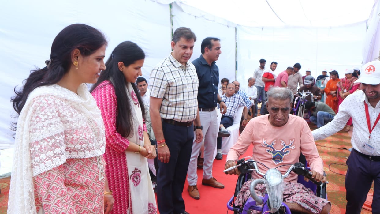 Tricycles given to handicapped on Red Cross Day